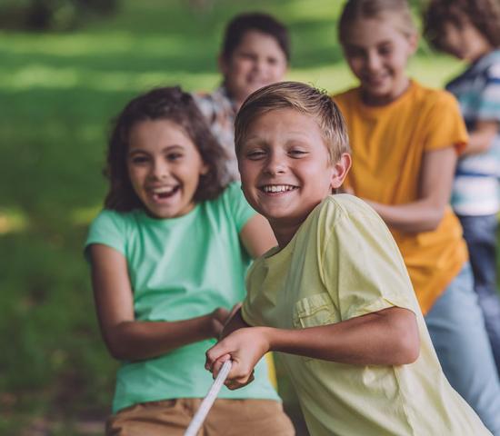 children playing tug of war