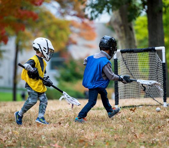 children playing lacrosse