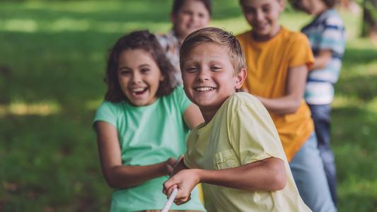 children playing tug of war