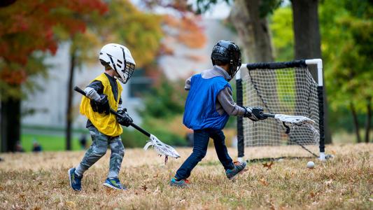 children playing lacrosse